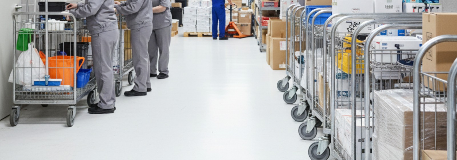 Back-end retail logistics using utility trolleys in shopping mall